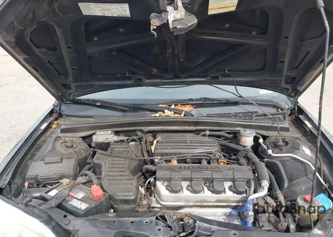 2002 Honda Civic Lx z USA, uszkodzony, nr VIN 1HGEM22552L057117